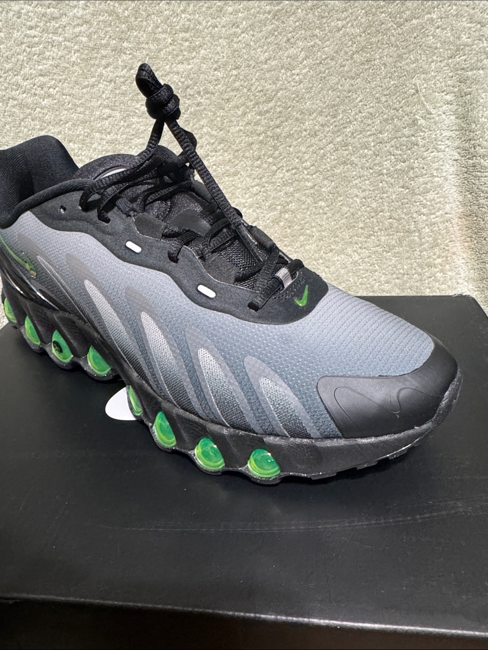 Nike Black and Gray Athletic Shoe with Neon Green Pods